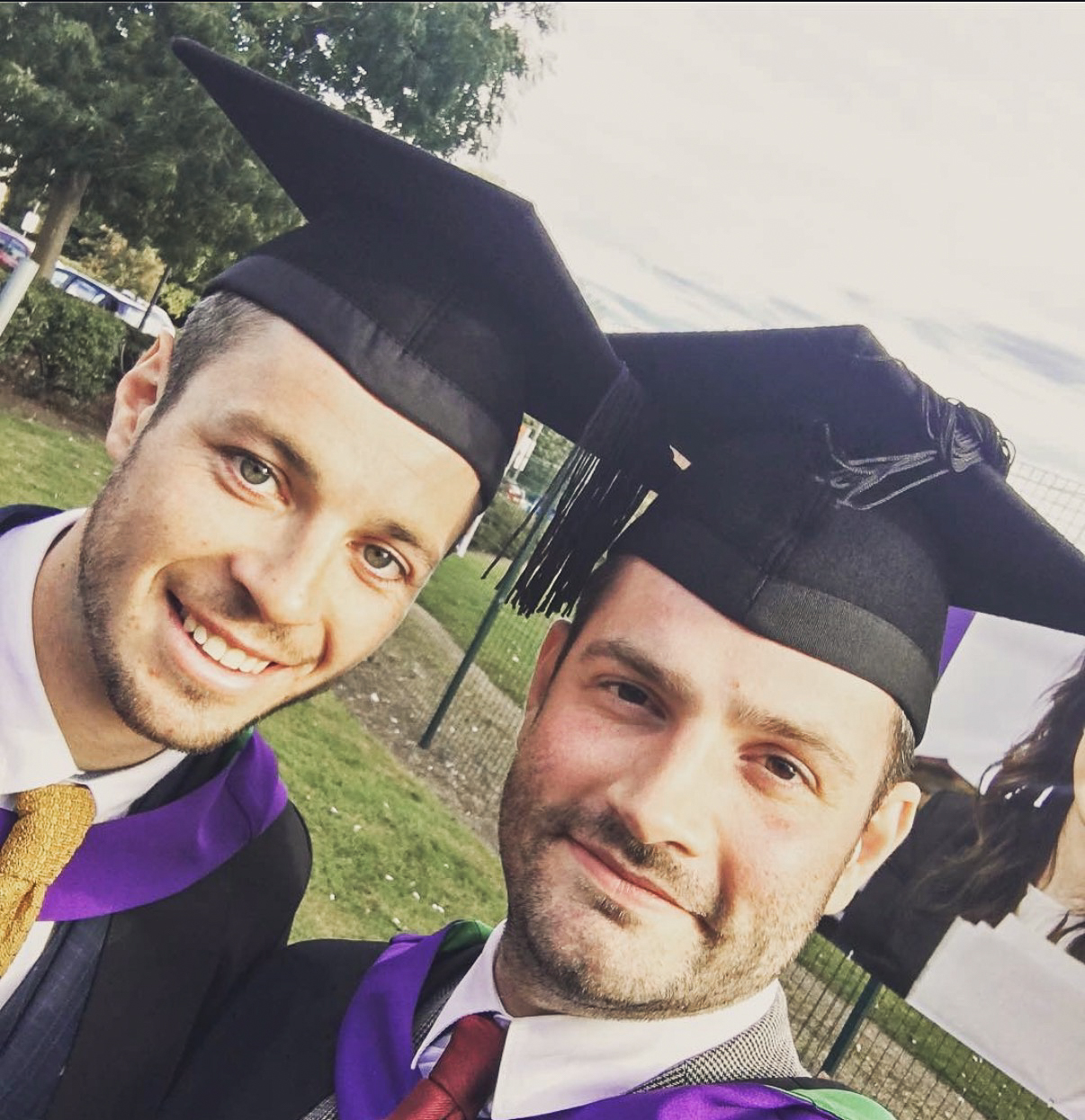 Andrew Clapham and Jack Davey on their architecture masters graduation day, mortarboards and gowns, years before founding we are _ architecture studio in Leeds