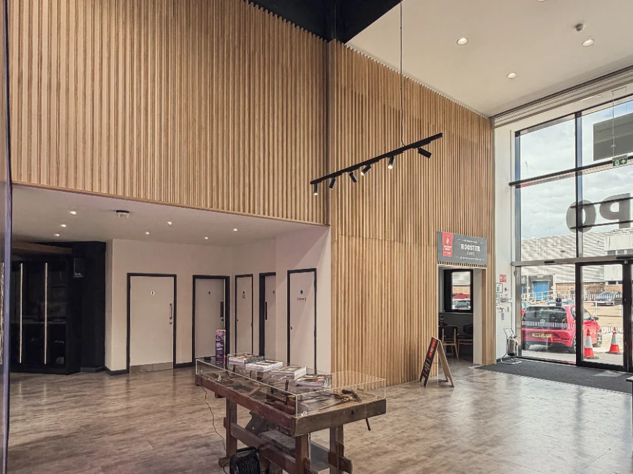Ply slat feature wall inside the Howdens Expo, Watford