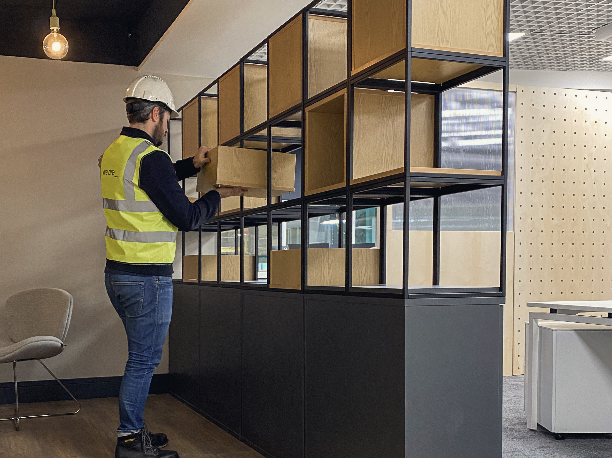 On-site progress during a Howdens interior fit-out, with we are _ acting as lead designer